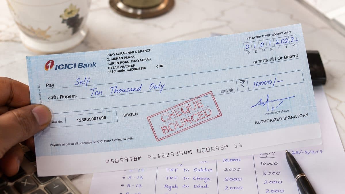 A dishonoured cheque with a bank return memo